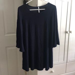Navy tunic with subtle ruffle sleeve
